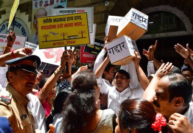 MUMBAI INDIA JUNE 20 2023 NCP party leader Supriya Sule along with party workers stage a protest against Eknath Shinde faction Shiv Sena quits MVA government completion of one year NCP workers called today as a Gaddar Din Traitor Day to protest for t clipart