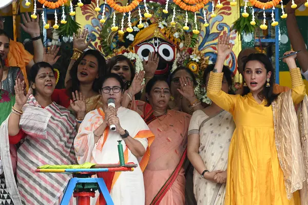 stock image KOLKATA INDIA JUNE 20 2023 Chief Minister of West Bengal Mamata Banerjee with MP Mimi Chakraborty R inaugurates International Society for Krishna Consciousness ISKCON Rath Yatra on June 20 2023 in Kolkata India The Jagannath Puri Rath Yatra is an ann