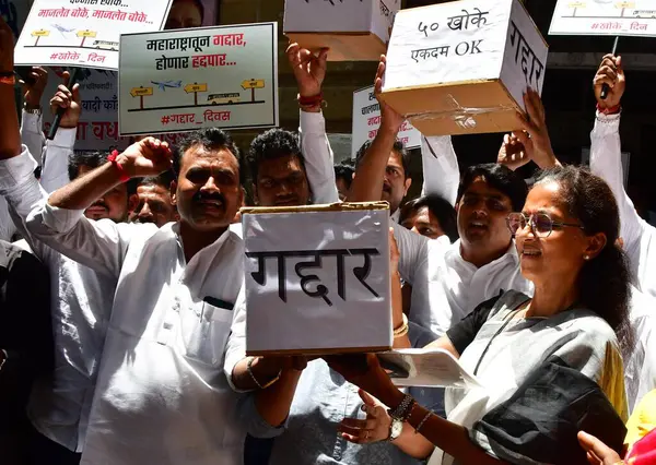 stock image MUMBAI INDIA JUNE 20 2023 NCP party leader Supriya Sule along with party workers stage a protest against Eknath Shinde faction Shiv Sena quits MVA government completion of one year NCP workers called today as a Gaddar Din Traitor Day to protest for t