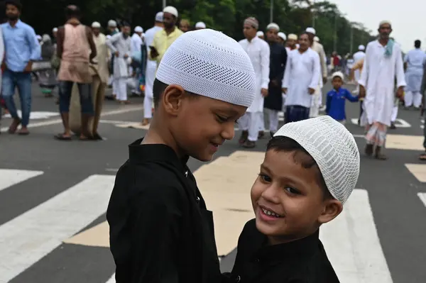 stock image KOLKATA INDIA JUNE 29 2023 Young Muslim devotees after offering prayers on the occasion of Eid ul Adha also known as Feast of Sacrifice or Bakra Eid at Red Road on June 29 2023 in Kolkata India Eid ul Adha also known as Bakra Eid Bakrid Eid al Adha E