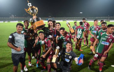 LUCKNOW INDIA SEPTEMBER 2 2024 Football club Mohan Bagan team players celebrate with the winning trophy of Chief Minister Cup at KD Singh Babu Stadium Photo by Deepak Gupta Hindustan Times clipart