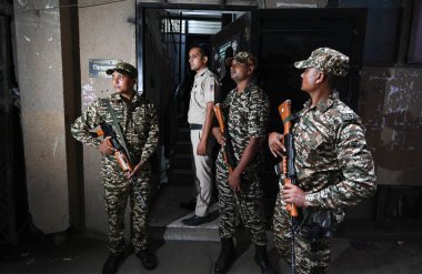 NEW DELHI INDIA SEPTEMBER 2 2024 Security officials seen deployed outside the residence of Amanatullah Khan MLA from Aam Admi Party as officials from ED carries out searches at his residence in Batla House Amanatullah Khan is arrested by the ED  clipart