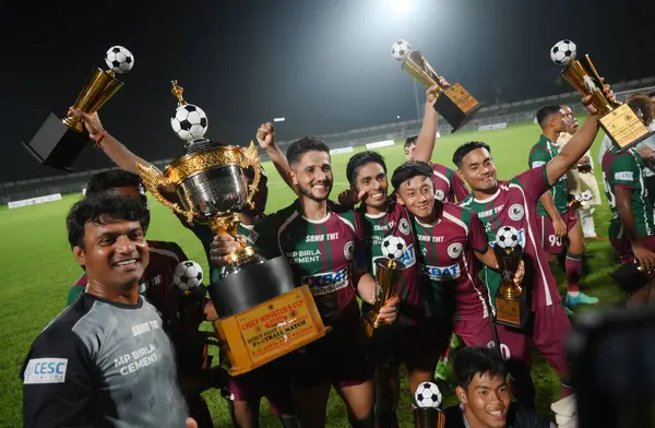 stock image LUCKNOW INDIA SEPTEMBER 2 2024 Football club Mohan Bagan team players celebrate with the winning trophy of Chief Minister Cup at KD Singh Babu Stadium Photo by Deepak Gupta Hindustan Times