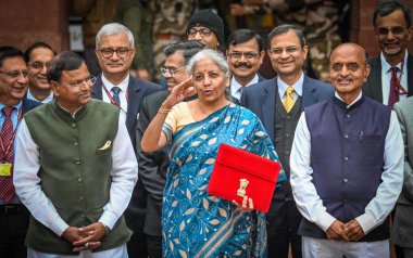 NEW DELHI INDIA FEBRUARY 1 2024 Nirmala Sitharaman Union Minister of Finance along with Bhagwat Karad and Pankaj Chaudhary MOS Finance leaves the Finance Ministry carrying the Finance Budget ahead of the presentation of interim Budget 2024 in Parliam clipart