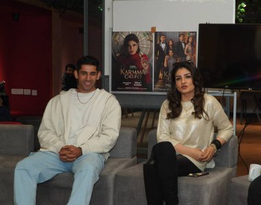 NEW DELHI INDIA FEBRUARY 2 2024  Bollywood actors Raveena Tandon and Varun Sood during an exclusive interview with HT City for the promotion of upcoming thriller series Karmma Calling on February 2 2024 in New Delhi India Photo by Anurag Mehra Hindus clipart