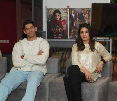 NEW DELHI INDIA FEBRUARY 2 2024  Bollywood actors Raveena Tandon and Varun Sood during an exclusive interview with HT City for the promotion of upcoming thriller series Karmma Calling on February 2 2024 in New Delhi India Photo by Anurag Mehra Hindus clipart