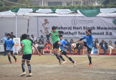 GURUGRAM INDIA FEBRUARY 4. 2024 İskoç Uluslararası Lise Yeşil forması ve Shiv Nadar Blue forması öğrenci takımı Maharaj Hari Singh Anma Futbol Turnuvası 30. 