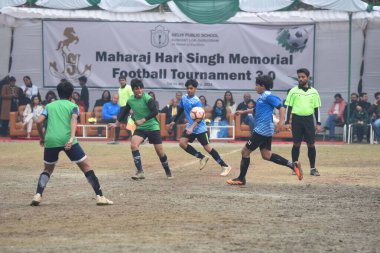 GURUGRAM INDIA FEBRUARY 4. 2024 İskoç Uluslararası Lise Yeşil forması ve Shiv Nadar Blue forması öğrenci takımı Maharaj Hari Singh Anma Futbol Turnuvası 30. 
