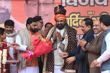 NEW DELHI INDIA FEBRUARY 5 2024 Deputy Chief Ministers of Bihar Samrat Choudhary and Vijay Kumar Sinha seen along BJP leader Manoj Tiwari Giriraj Singh and Virendra Sachdeva during the felicitation ceremony for the Deputy CMs of Bihar on behalf of Pe clipart