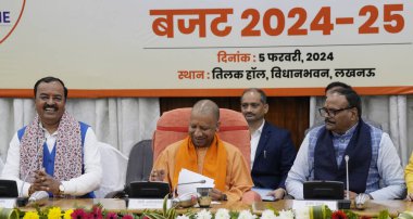 LUCKNOW INDIA FEBRUARY 5 2024 Uttar Pradesh Chief Minister Yogi Adityanath addressed a press conference after the state Budget for 2024 25 at Tilak Hall Deputy Chief Minister Keshav Prasad Maurya Brijesh Pathak and Finance Minister Suresh Khanna also clipart