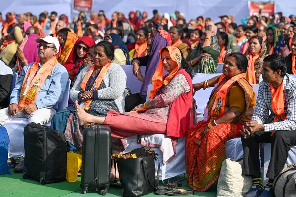 stock image NEW DELHI INDIA FEBRUARY 5 2024 Senior citizens who are departing for Tirupati Balaji on the 89th train under Mukhyamantri Teerth Yatra Yojana interacting with Arvind Kejriwal Chief Minister of Delhi during an event at Thyagraj Stadium on February 5 