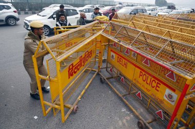 GURUGRAM INDIA FEBRUARY 13 2024 Traffic congestion at DelhiGurugram Expressway due to Delhi Police officials put barricades after the Delhi Chalo protest called by farmers near Sirhaul toll plaza on February 13 2024 in Gurugram India Massive deployme clipart