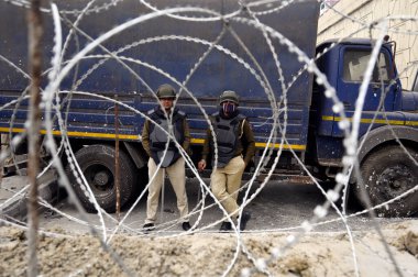 NEW DELHI INDIA FEBRUARY 13 2024 Delhi Police and other Security officials put barricades as a preventive measure after the Delhi Chalo protest call by farmers at Ghazipur Border on February 13 2024 in New Delhi India Photo by Sanjeev Verma Hindustan clipart