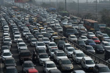 NEW DELHI INDIA FEBRUARY 14 2024 Heavy traffic jam at Delhi Meerut Expressway after Delhi Police placed barricades at several locations to stop the farmers call for protest march on February 14 2024 in New Delhi India Massive deployments of police an clipart