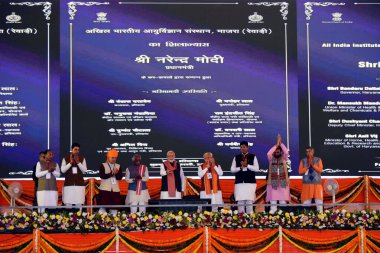 REWARI INDIA FEBRUARY 16 2024 Prime Minister Narendra Modi and Haryana Chief Minister Manohar Lal Khattar during the inaugurates lays foundation stone of countrys 22nd All India Institute Of Medical SciencesAIIMS and other projects at Majra Bhalkhi o clipart