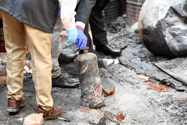 stock image NEW DELHI INDIA FEBRUARY 16 2024 FSL team at the site of a paint godown that caught fire last night resulting in the death of 11 people on February 16 2024 in New Delhi IndiaPhoto by Raj K Raj Hindustan Times