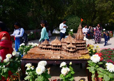 NEW DELHI INDIA FEBRUARY 18 2024 Visitors take selfies and photos with replica of Ram Temple during the 36th Garden Tourism Festival organized by Delhi Tourism in collaboration with the Delhi Government held at Garden of Five Senses on February 18 20 clipart