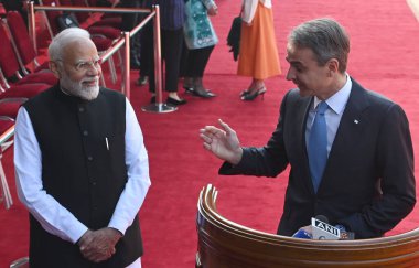 NEW DELHI INDIA FEBRUARY 21 2024 Prime Minister Narendra Modi greets Prime Minister of Greece Kyriakos Mitsotakis address media persons during the latters ceremonial reception at the Rashtrapati Bhavan on February 21 2024 in New Delhi India Photo by  clipart