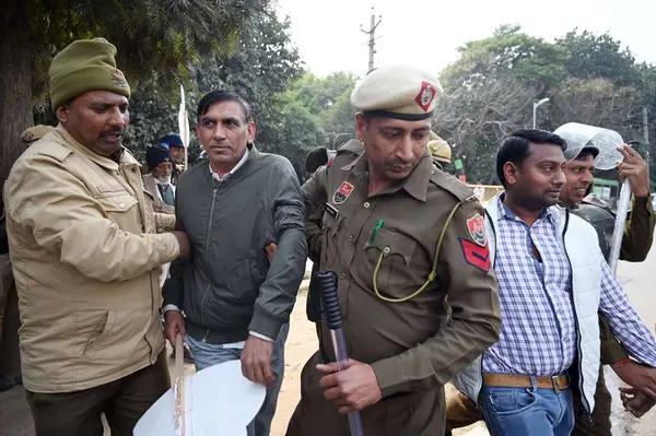 stock image GURUGRAM INDIA FEBRUARY 20 2024 Farmers attempting to travel to Delhi in support of the Punjab farmers protest were detained by Haryana Police in Manesar near the HUDA office on February 20 2024 in Gurugram India Photo by Parveen Kumar Hindustan Time