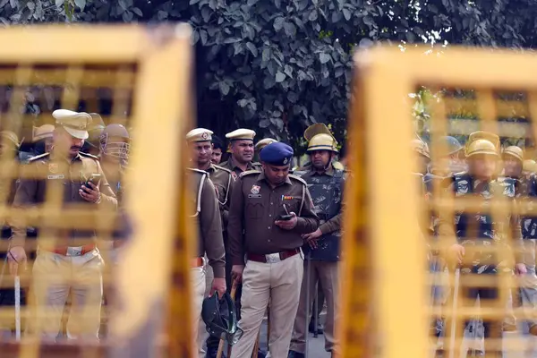 stock image GURUGRAM INDIA FEBRUARY 20 2024 Farmers attempting to travel to Delhi in support of the Punjab farmers protest were detained by Haryana Police in Manesar near the HUDA office on February 20 2024 in Gurugram India Photo by Parveen Kumar Hindustan Time