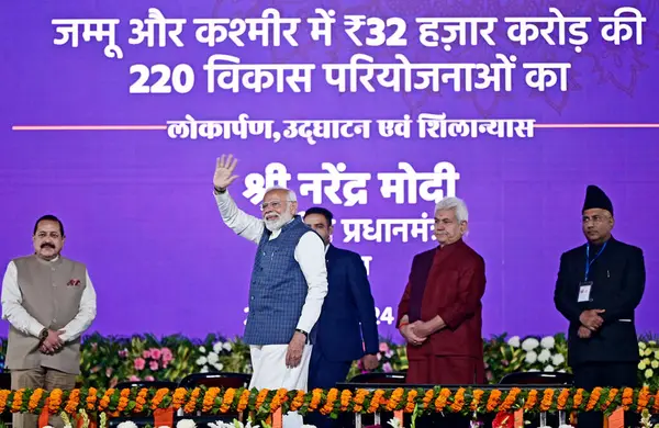 stock image JAMMU INDIA FEBRUARY 20 2024 Prime Minister Narendra Modi along with Union Minister Jitendra Singh and Jammu and Kashmir Lieutenant Governor Manoj Sinha waves at a public rally at the Maulana Azad Stadium during which he inaugurated several projects 