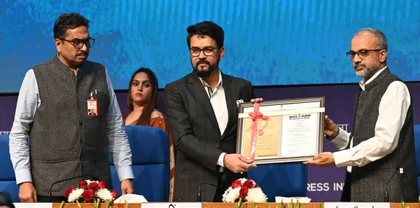 stock image NEW DELHI INDIA FEBRURAY 22 2024 Union Minister for IB Anurag Thakur with IB Secretary Sanjay Jaju and Press Registrar  Head Of The Department RNI Bhupendra Kainthola during the launch of online portals of the Central Bureau of Communication CBC Regi