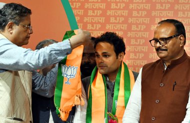 NEW DELHI INDIA FEBRUARY 25 2024 Ritesh Pandey Lok Sabha MP from Ambedkar Nagar joins BJP in presence of UP Dy CM Brajesh Pathak and other BJP leaders on February 25 2024 in New Delhi India Ritesh Pandey said he had worked for the BSP for the last 15 clipart