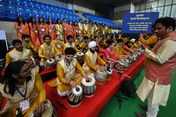 stock image NEW DELHI INDIA FEBRUARY 24 2024 Students perform during the 100th convocation of the Delhi University to award medals and prizes to the meritorious students and confer the degrees at DU Sports complex on February 24 2024 in New Delhi India Jagdeep D