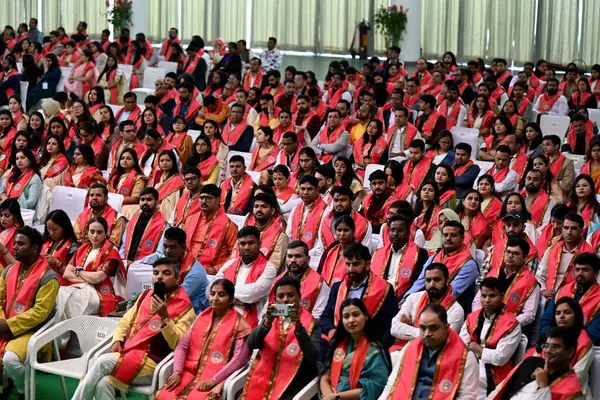 stock image NEW DELHI INDIA FEBRUARY 24 2024 Students during the 100th convocation of the Delhi University to award medals and prizes to the meritorious students and confer the degrees at DU Sports complex on February 24 2024 in New Delhi India Jagdeep Dhankhar 