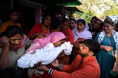 NEW DELHI INDIA FEBRUARY 25 2024 Mother of a child grief after a 18 month old child died after street dogs attack and bite during yesterday evening at Tughlak lane Dhobi Ghat on February 25 2024 in New Delhi India Photo by Salman Ali Hindustan Times  clipart