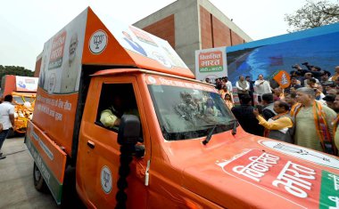 NEW DELHI INDIA FEBRUARY 26 2024 BJP National President JP Nadda during flagging off the Viksit Bharat Modi Ki Guarantee Rath on February 26 2024 in New Delhi India The Rath Yatra is to highlight the achievements of the PM Modiled NDA Government over clipart