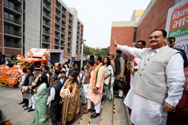 NEW DELHI INDIA FEBRUARY 26 2024 BJP National President JP Nadda launched resolution letter suggestion campaign and flags off the vehicles at BJP office ahead of 2024 general election on February 26 2024 in New Delhi India The Rath Yatra is to highli clipart