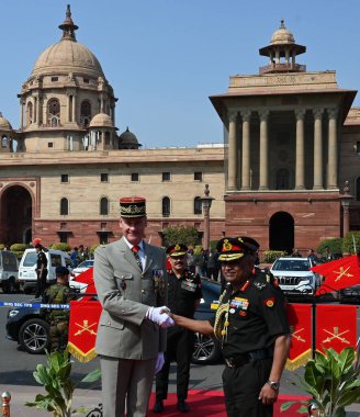 NEW DELHI INDIA FEBRUARY 27 2024 French Army Chief General Pierre Schill shakes hands with his Indian counterpart General Manoj Pande during his ceremonial reception at South Block Central secretariat on February 27 2024 in New Delhi India Photos by  clipart