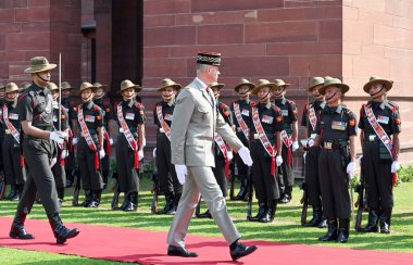 NEW DELHI INDIA FEBRUARY 27 2024 French Army Chief General Pierre Schill inspects the guard of honour during his ceremonial reception at the South Block on February 27 2024 in New Delhi India Photo by Sanjeev Verma Hindustan Times clipart