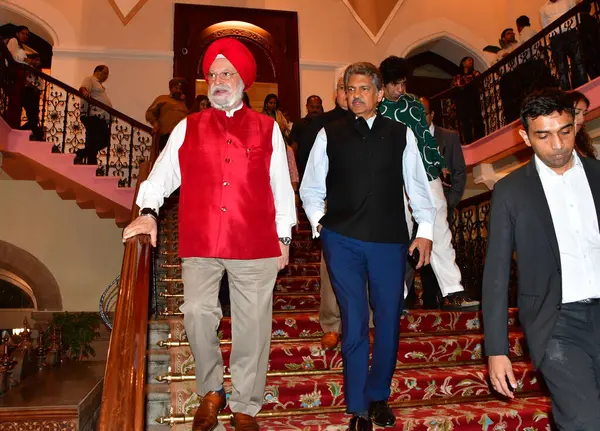 stock image MUMBAI INDIA FEBRUARY 27 2024 Minister of Petroleum and Natural gas Hardeep Singh Puri Chairman of Mahindra Group Anand Mahindra during the book launch Swallowing the Sun on February 27 2024 in Mumbai IndiaPhoto by Bhushan Koyande Hindustan Times 