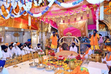 AMRITSAR INDIA SEPTEMBER 4 2024 A view of the Jalau show of splendour in the sanctum sanctorum inside the Golden Temple on the occasion of first installation anniversary of Sri Guru Granth Sahib at Golden Temple Photo by Hindustan Times  clipart