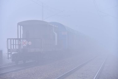 GHAZIABAD INDIA JANUARY 14 2024 Commuters out a cold and Foggy morning at Akash Nagar Railway Track on January 14 2024 in Ghaziabad India Foggy morning challenges Delhi NCR with intensifying cold wave mercury dips further across North India Photo by  clipart