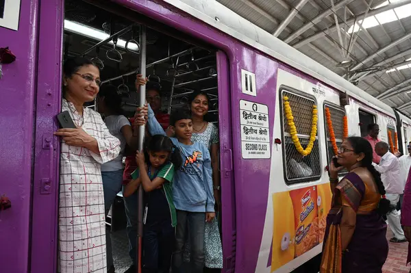 stock image NAVI MUMBAI INDIA JANUARY 12 2024 Commuters during flaging off of trains starting from Uran to Nerul by PM Narendra Modi flags at Uran Photo by Bachchan Kumar HT PHOTO 