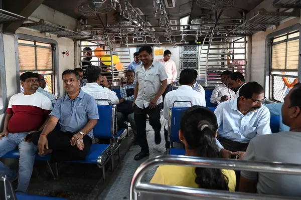 stock image NAVI MUMBAI INDIA JANUARY 12 2024 Commuters after flaging off of trains starting from Uran to Nerul by PM Narendra Modi flags at Uran Photo by Bachchan Kumar HT PHOTO 