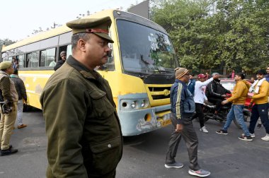 NOIDA INDIA JANUARY 1 2024 Drivers of transport buses protesting against the enactment of a law giving 10 years of imprisonment after death in a road accident in Sector 62 Commercial vehicle drivers on Monday staged massive protests in several states clipart