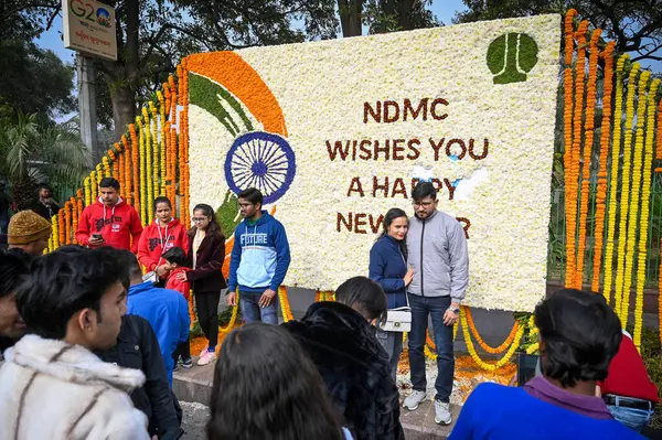 stock image NEW DELHI INDIA JANUARY 1 2024 People seen taking selfies on the first day of the year at Connaught Place Photo by Sanchit Khanna Hindustan Times 