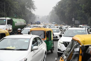 NEW DELHI INDIA JANUARY 5 2024 Heavy traffic Jam round about India Gate due to Lawyers and activist of Various organizations and individuals have been raising voice use of EVMs in Election including by filing petitions before Election Commission of I clipart