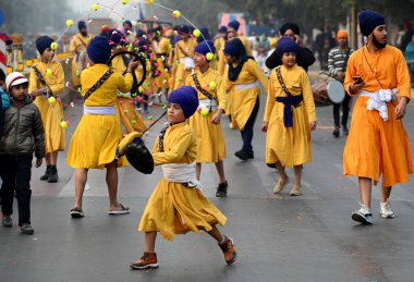 NOIDA INDIA JANUARY 7 2024 Sikh devotees during Nagar Kirtan procession carried out as part of Prakash Utsav ahead of Guru Gobind Singh birth anniversary The birth anniversary of Guru Maharaj falls on January 17 and traditionally every year a Nagar K clipart