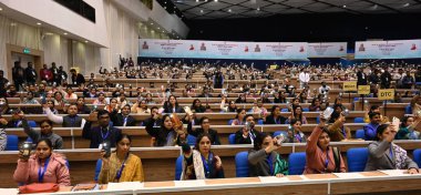 NEW DELHI INDIA JANUARY 9 2024 Newly selected candidates to various departments after presenting by Lt Governor of Delhi Vinai Kumar Saxena at Vigyan Bhawan during the hand over the appointment letter of appointment to newly recruited government offi clipart