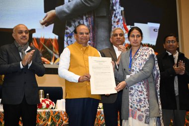 NEW DELHI INDIA JANUARY 9 2024 Lt Governor of Delhi Vinai Kumar Saxena along with Chief Secretary of Delhi Naresh Kumar NDMC chairman Amit Yadav and other officers handover the appointment letters to newly recruited government officials appointed in  clipart