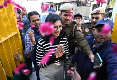 NEW DELHI INDIA JANUARY 12 2024 Swati Maliwal with party supporters after receiving certificate at the DM office to Unopposed winning Rayja sabha election Massive gathering outside DM office of women to her support After scrutiny Aam Aadmi Party thre clipart