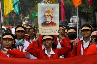 KOLKATA INDIA JANUARY 12 2024 On 161th birth anniversary of Swami Vivekananda students participate in a colorful procession from Swami ji ancestral house Photo by Samir Jana Hindustan Times  clipart