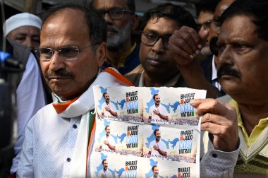 KOLKATA INDIA JANUARY 13 2024 Indian National Congress Party leader Adhir Ranjan Chowdhury shows stickers of Bharat Jodo Nyay Yatra during a campaign rally Photo by Samir Jana Hindustan Times  clipart