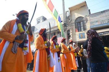 GURUGRAM INDIA JANUARY 14 2024 A glimpse of the Nagar Kirtan procession ahead of birth anniversary of the tenth Guru Gobind Singh at new colony near police chowki Photo by Parveen Kumar Hindustan Times  clipart