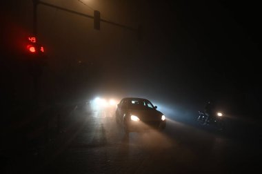 NEW DELHI INDIA JANUARY 14 2024 Thick fog blankets engulfed with extreme low visibility at Mathura Road during early morning hours Foggy morning challenges Delhi NCR with intensifying cold wave mercury dips further across North India Photo by Salman  clipart